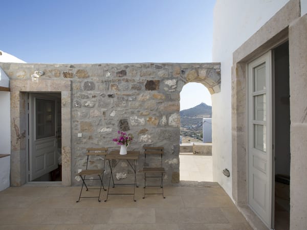 A shady spot in the courtyard between the main house (on the right) and the first externally accessed guest bedroom.